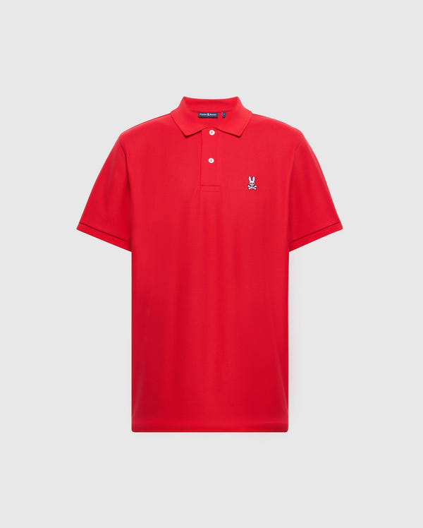 The Psycho Bunny Men's Classic Pique Polo Shirt, B6K001CRPC, in rich red, is made from premium Pima cotton with short sleeves, a collar, and mother-of-pearl buttons. It features a small embroidered rabbit logo on the left chest.
