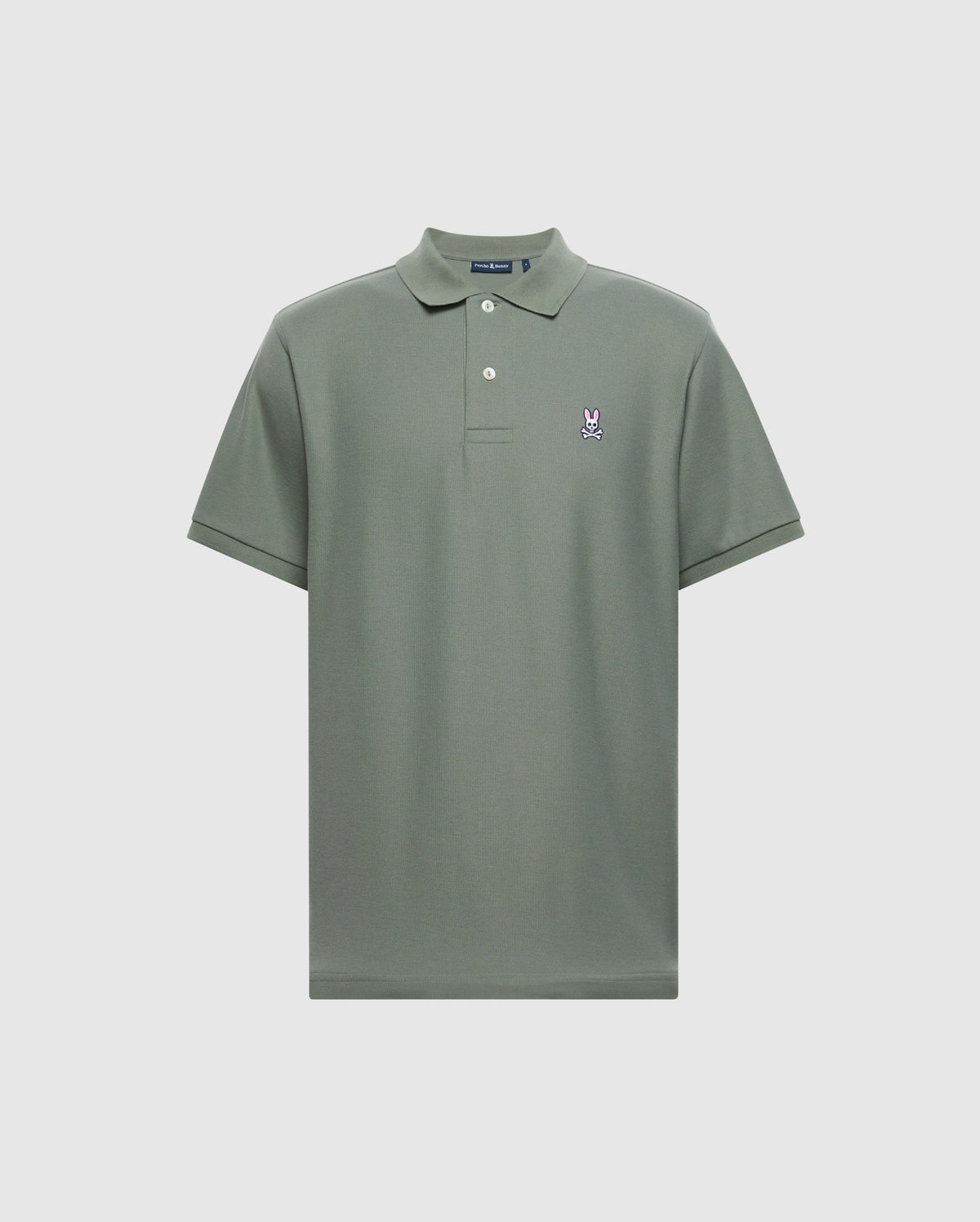 The Psycho Bunny MENS CLASSIC PIQUE POLO SHIRT - B6K001B200, in green Pima cotton, features a small embroidered Bunny logo on the left chest. It has a classic collar and a two-button placket for a timeless style.