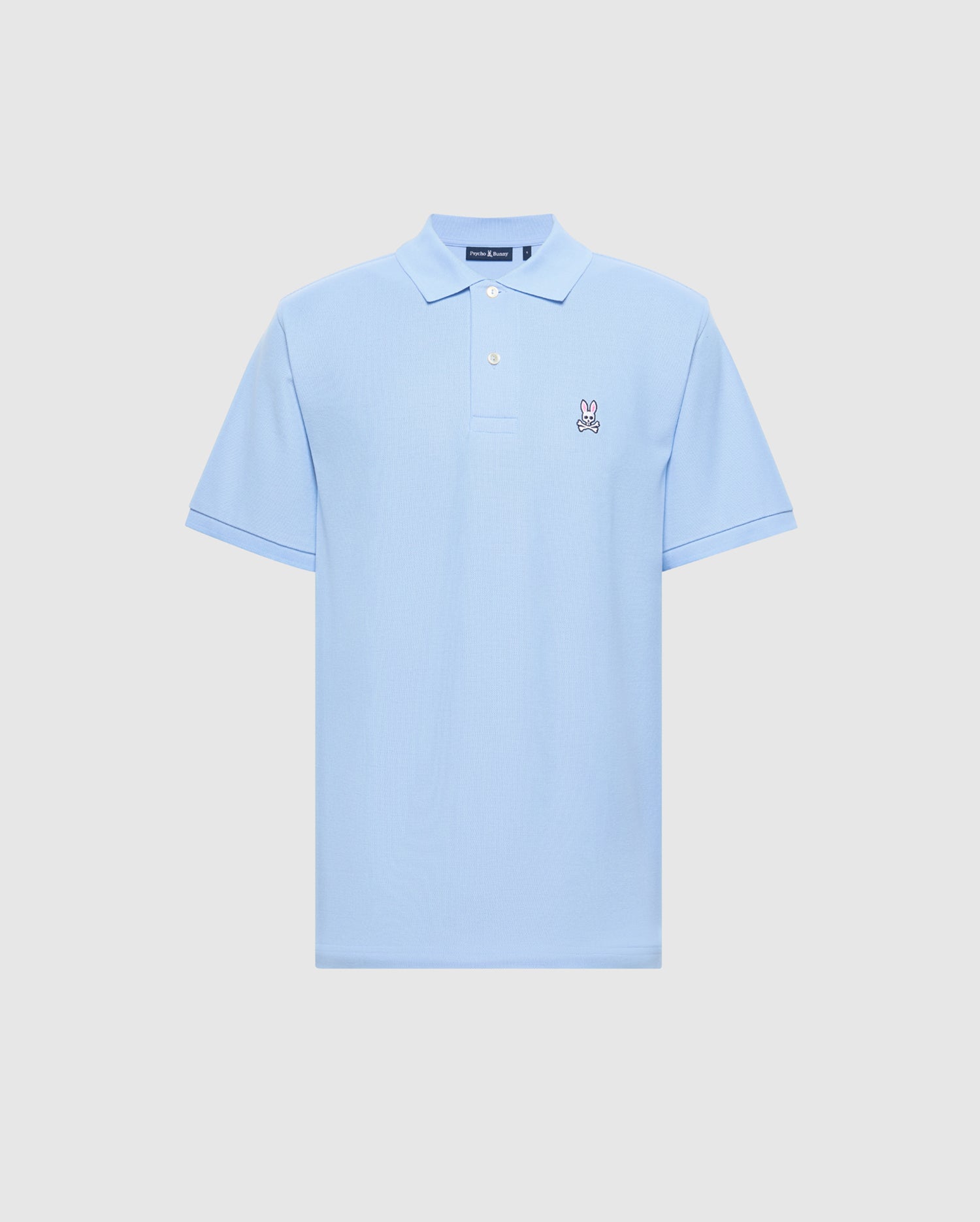 The Men's Classic Piqué Polo Shirt by Psycho Bunny (B6K001B200) in light blue is crafted from soft Pima cotton, featuring a small embroidered bunny logo on the left chest, with a classic collar and button placket for timeless style.