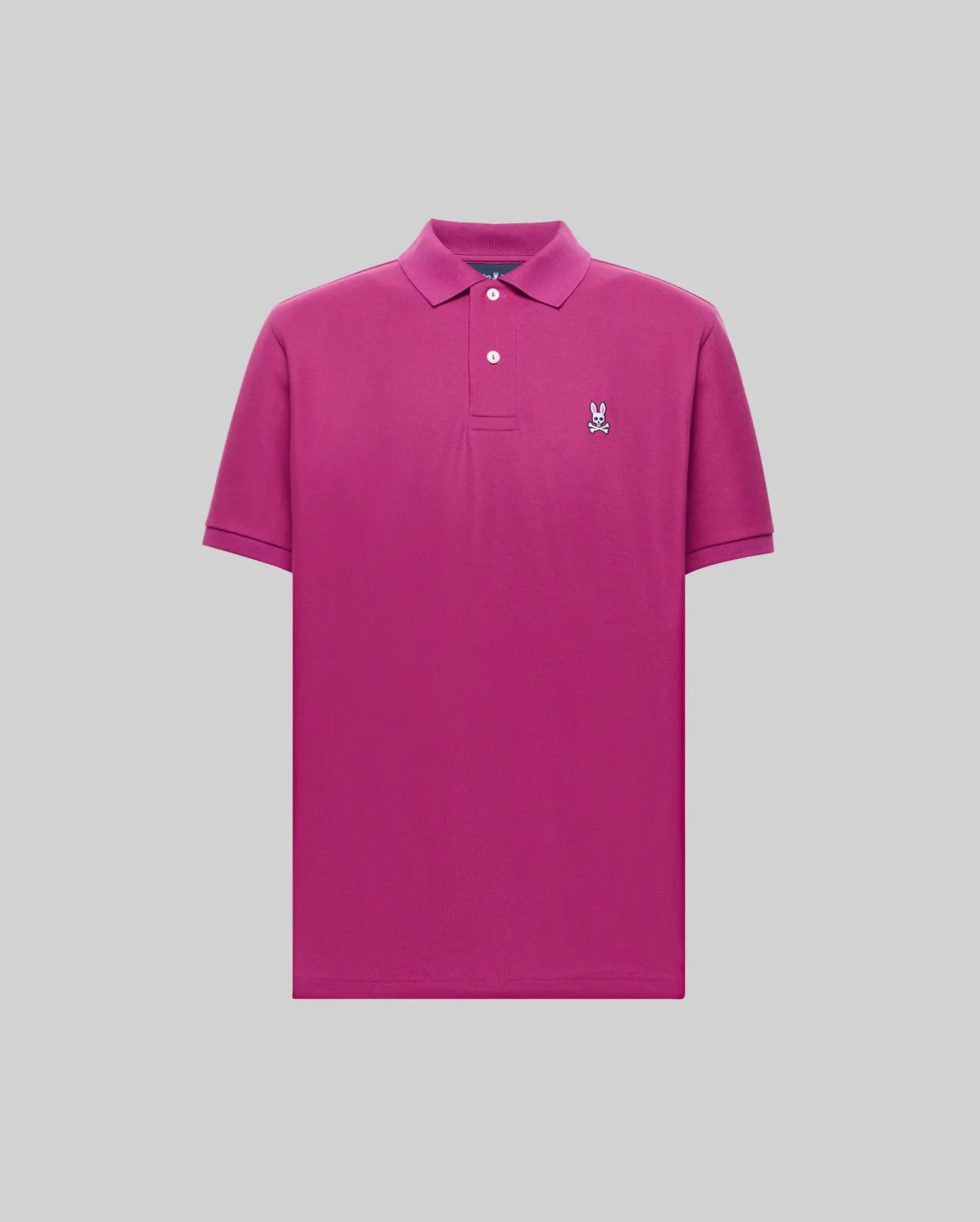 A bright pink Psycho Bunny MENS CLASSIC PIQUE POLO (B6K001F200) in soft Pima cotton, featuring short sleeves, a collar with two buttons, and an embroidered Bunny logo on the left chest, displayed on a light gray background.