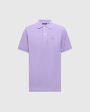 The Psycho Bunny Men's Classic Pique Polo Shirt (B6K001Z1PC) is a lavender short-sleeve made from soft Pima cotton, featuring a collar, three buttons, and the embroidered Bunny logo on the left chest.