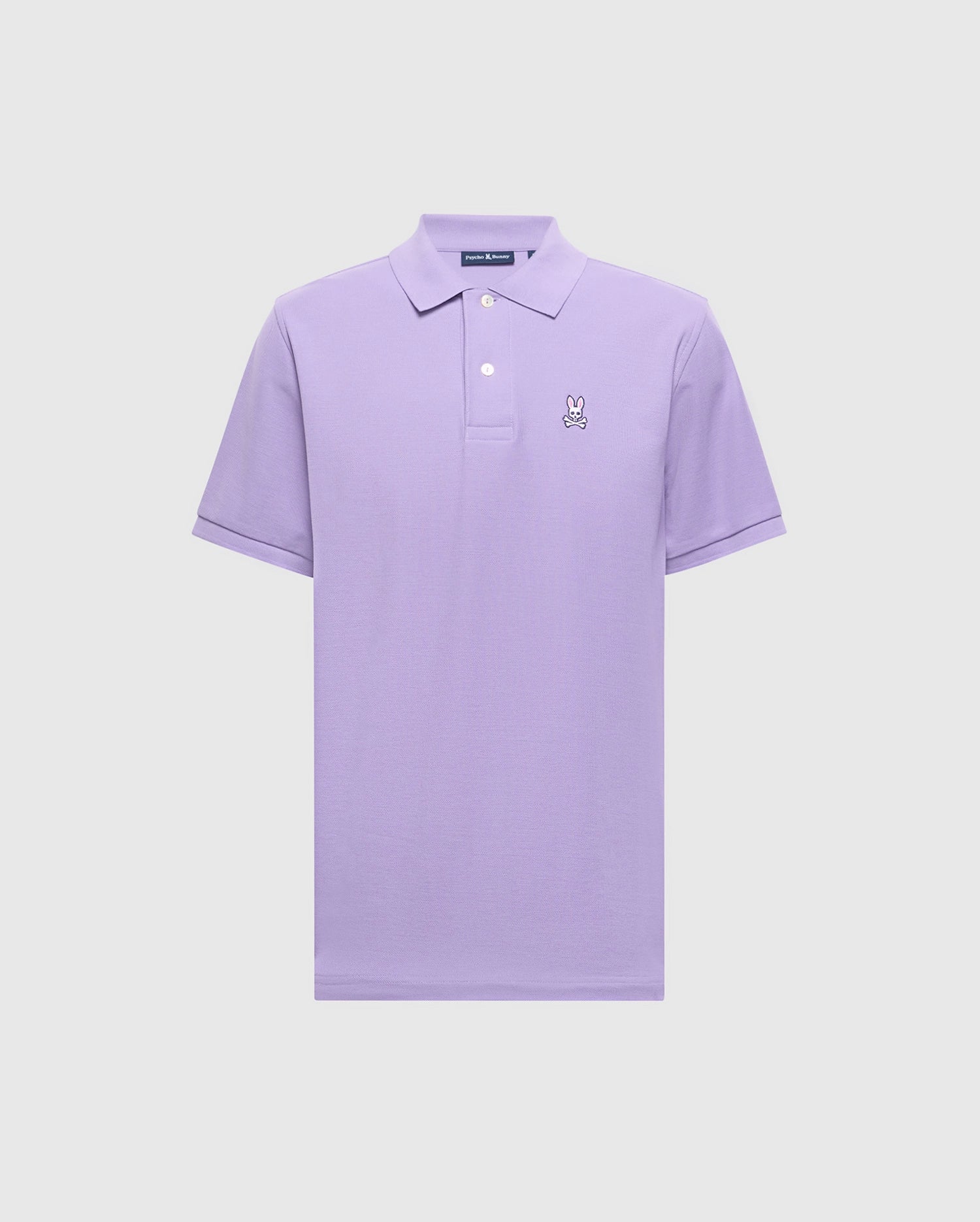 The Psycho Bunny Men's Classic Pique Polo Shirt (B6K001Z1PC) is a lavender short-sleeve made from soft Pima cotton, featuring a collar, three buttons, and the embroidered Bunny logo on the left chest.