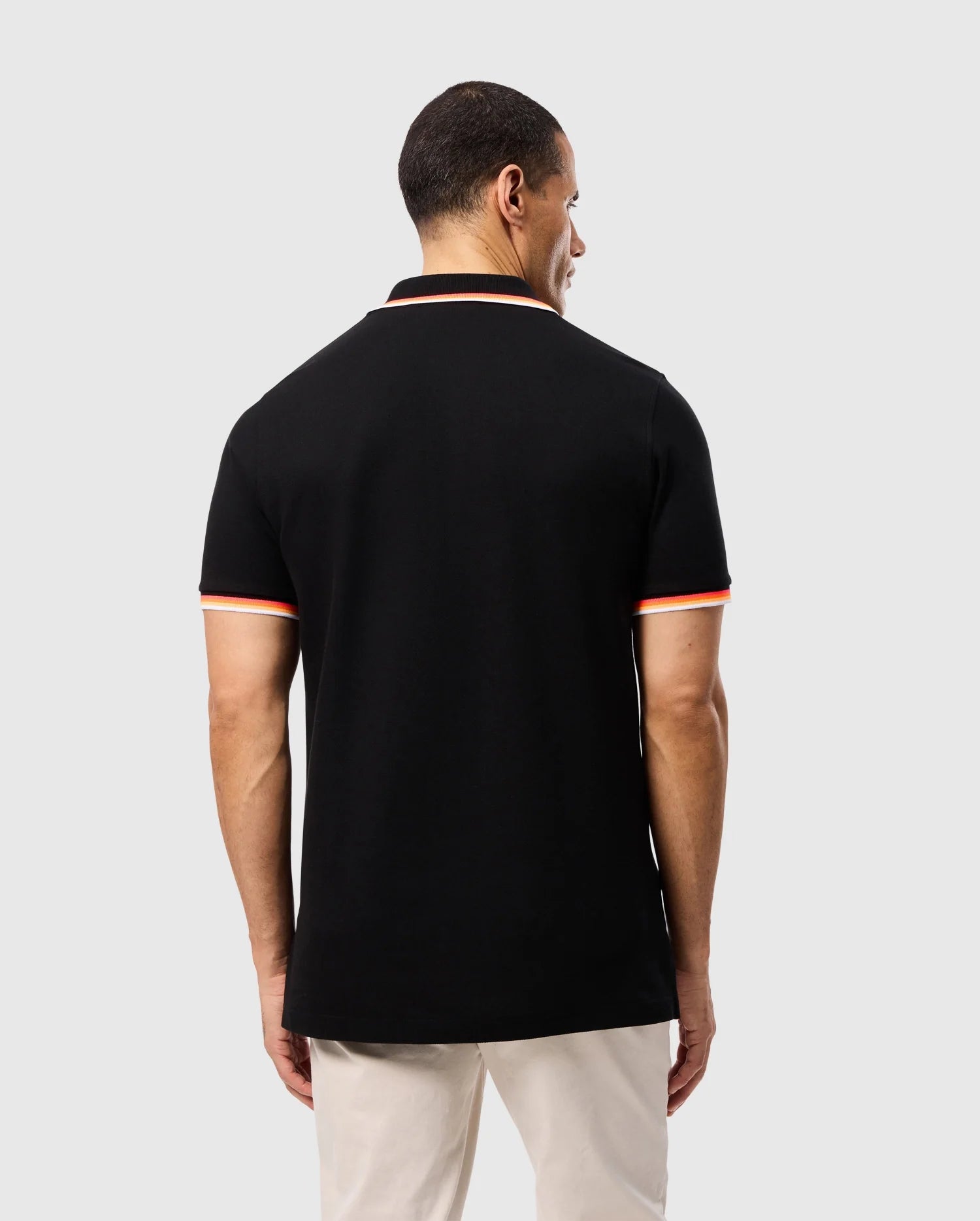 Black polo shirt with orange trim deals