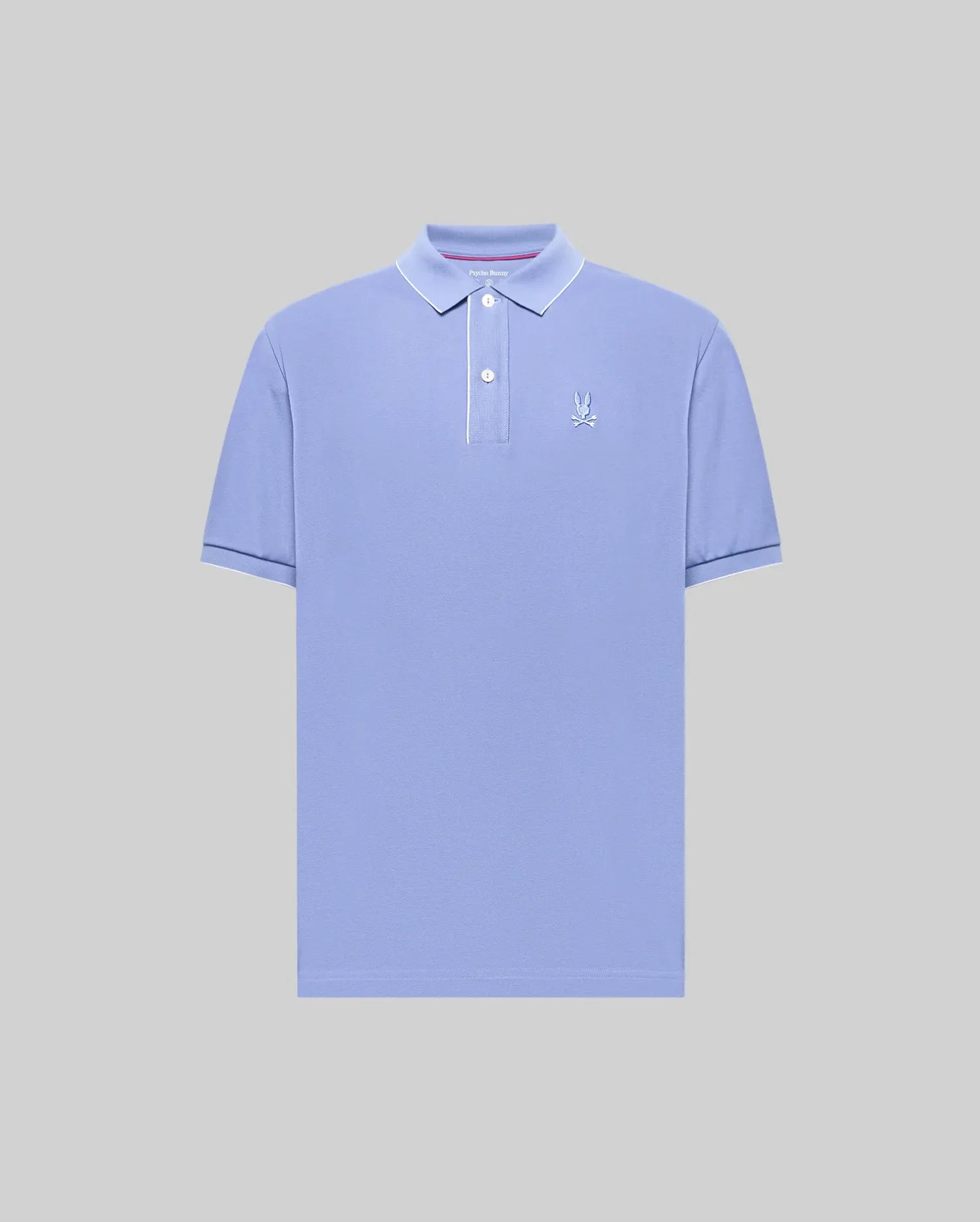 The Psycho Bunny MENS BRYCE PERFORMANCE PIQUE POLO (B6K486F200) features light blue performance piqué fabric, a collar, two buttons, and a small embroidered logo on the left chest, shown on a plain gray background.