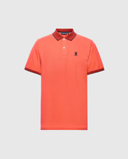 The Psycho Bunny MENS JONAS MICRO STRIPE COLLAR PIQUE POLO (B6K583F200) is coral with a micro-stripe pattern, regular fit, dark red collar and cuffs, made from soft Pima cotton with an embroidered standing rabbit logo on the left chest. It's displayed on a plain light gray background.