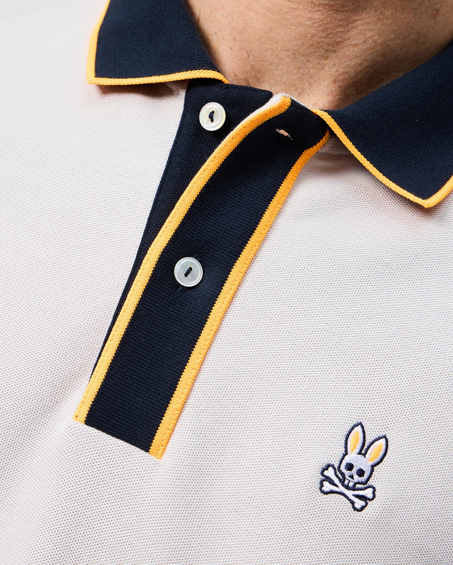 Black polo shirt with yellow collar hot sale