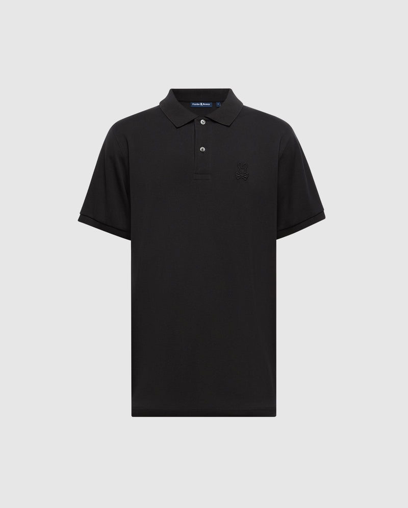 The Psycho Bunny MENS JAMES PREMIUM PIQUE POLO SHIRT - B6K945D200 is a lightweight black Pima cotton polo featuring short sleeves, a collar, a three-button placket, and a subtle embroidered logo on the left chest. It is showcased against a light gray background.