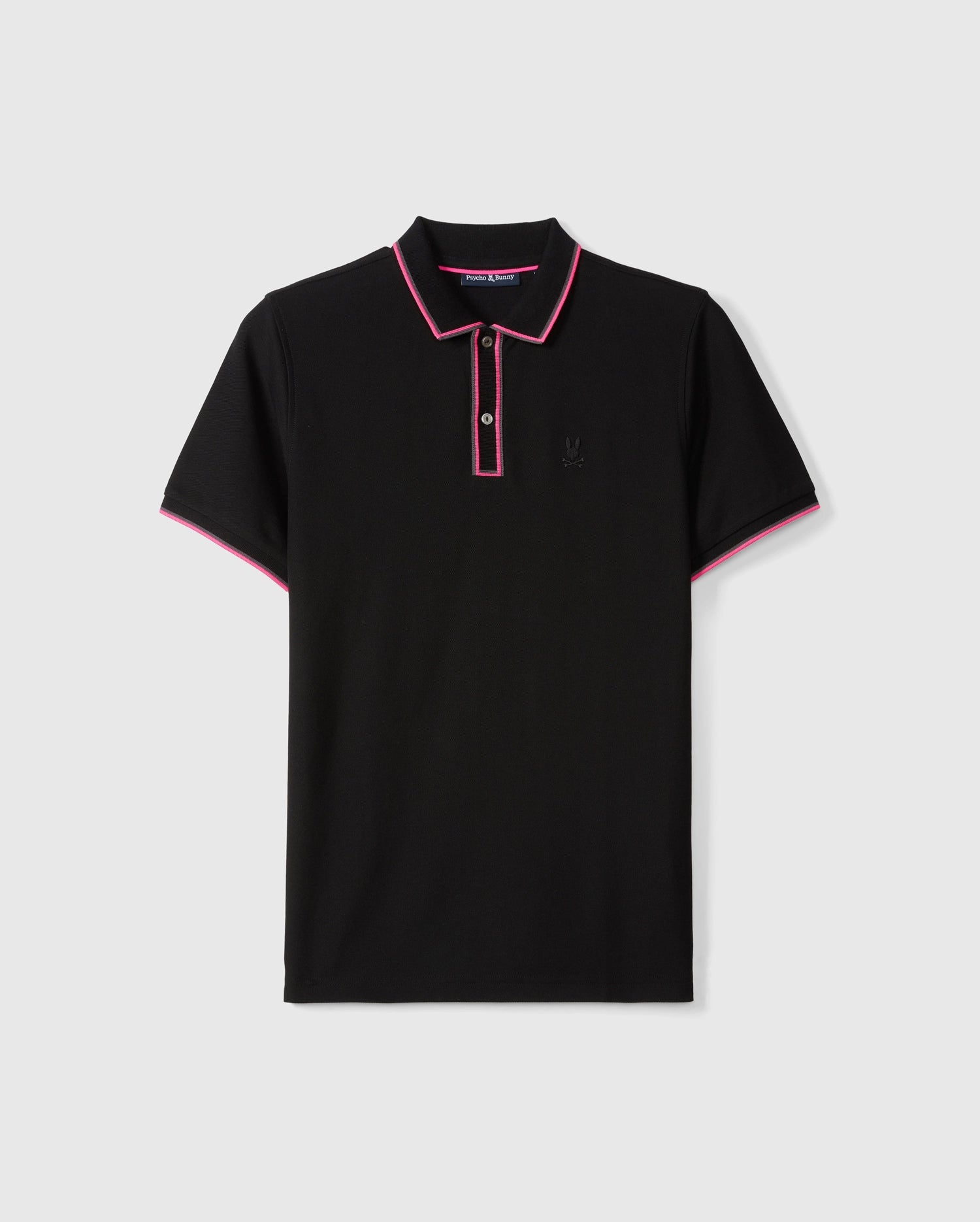 The MENS KENT PIQUE POLO SHIRT - B6K951D200 by Psycho Bunny is a stylish black polo shirt featuring pink trim on the collar and sleeve edges. Made from comfortable pique cotton, it includes a three-button placket and a small embroidered logo on the chest. Laid flat against a plain background, its sleek design truly stands out.