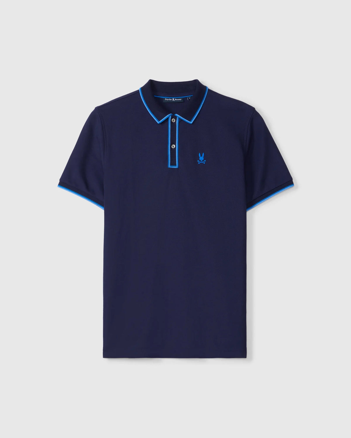 The Psycho Bunny MENS KENT PIQUE POLO SHIRT - B6K951D200 is a navy men's Pima cotton polo with light blue collar and sleeve trim, featuring a stylized bird logo on the left chest and a button-down placket, offering style and comfort.
