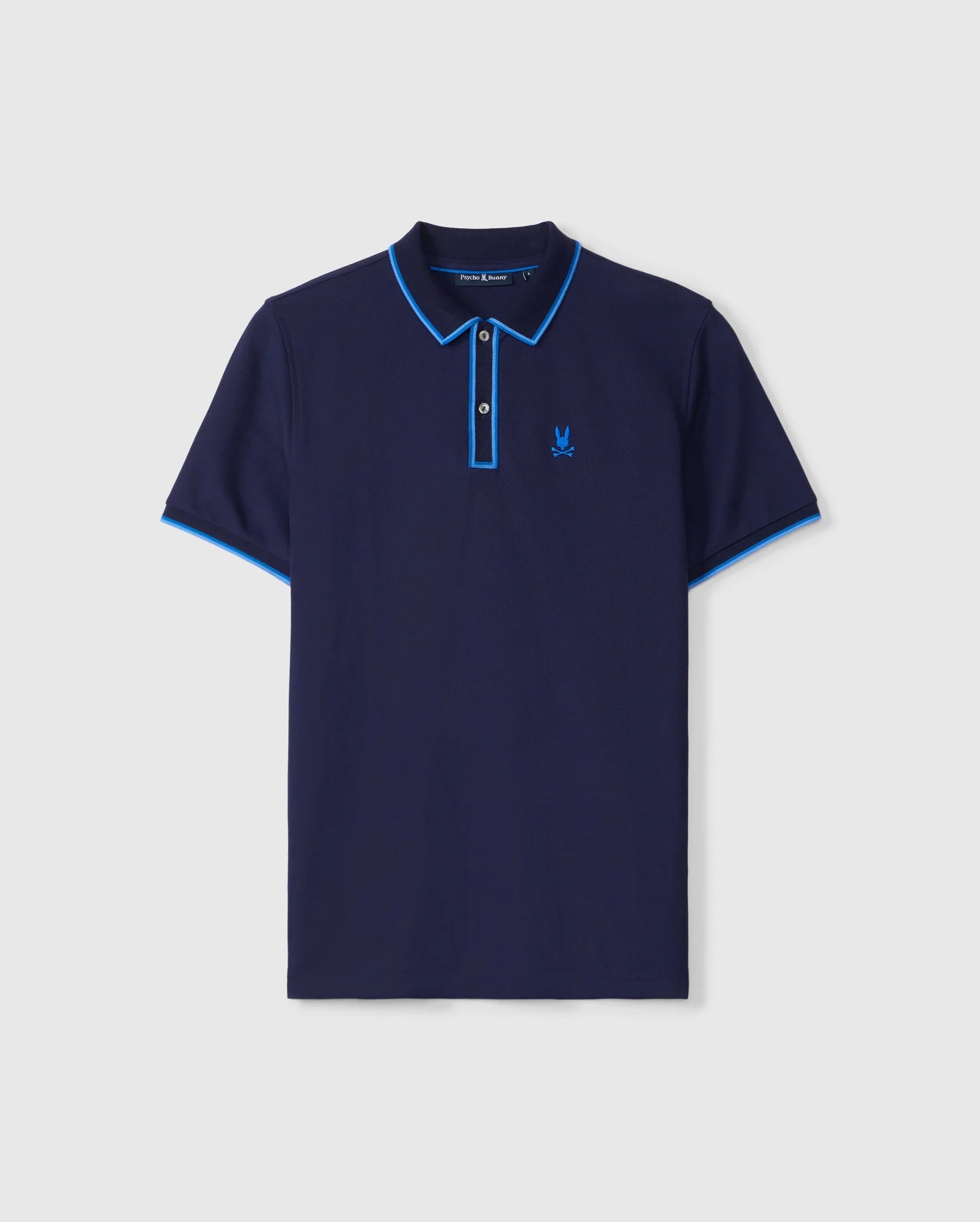 The Psycho Bunny MENS KENT PIQUE POLO SHIRT - B6K951D200 is a navy men's Pima cotton polo with light blue collar and sleeve trim, featuring a stylized bird logo on the left chest and a button-down placket, offering style and comfort.