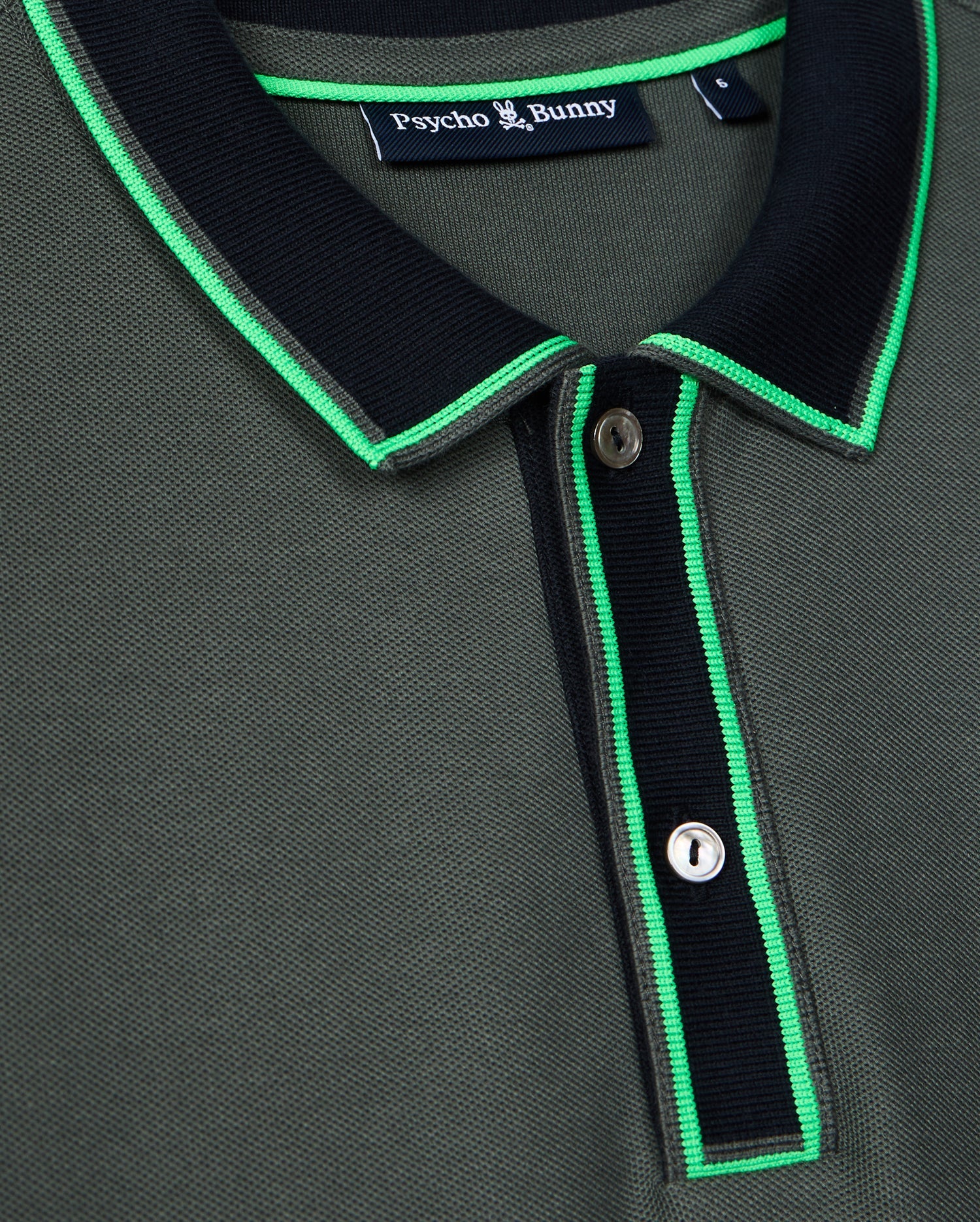 Black polo shirt with green collar outlet
