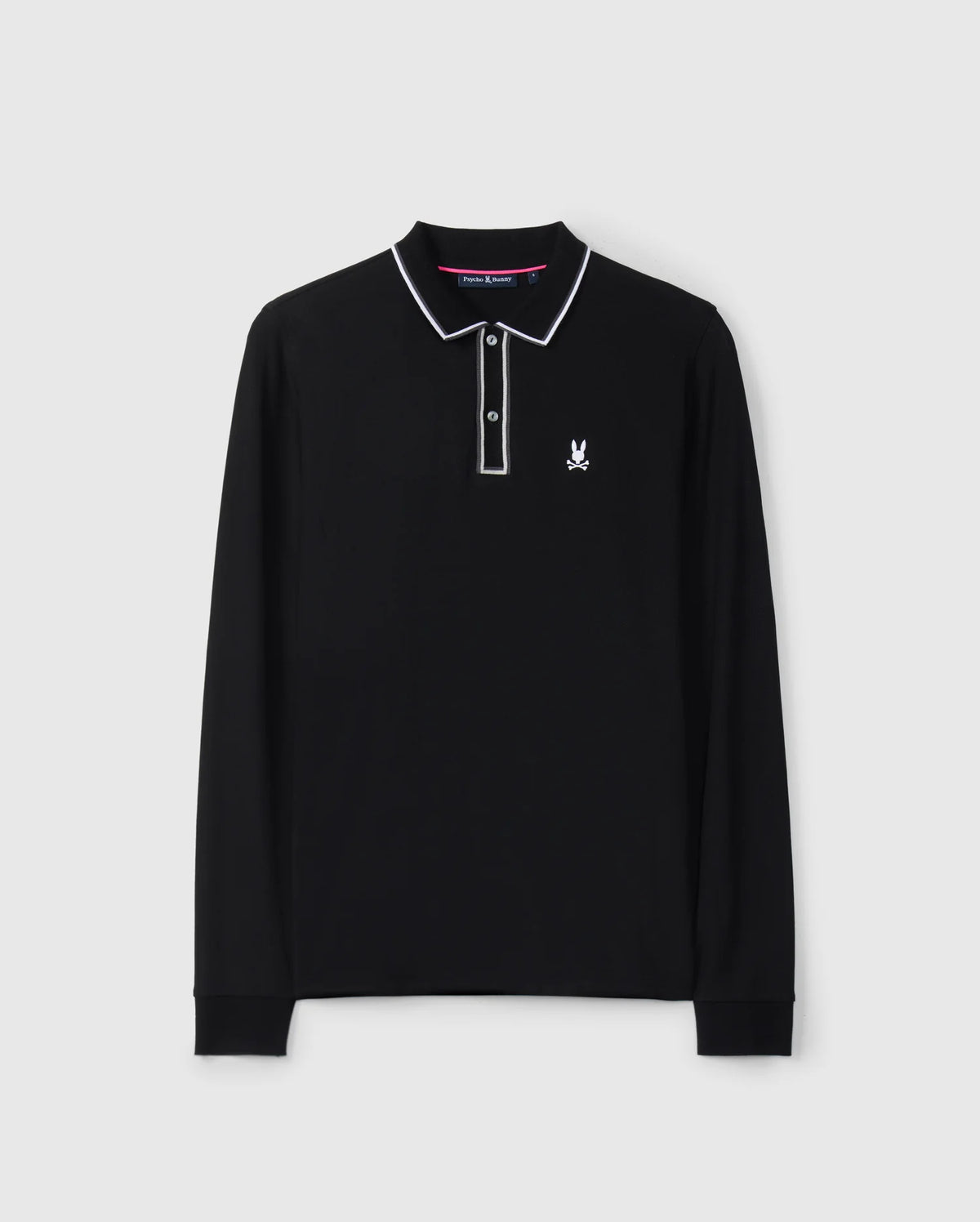 The Psycho Bunny Men's Kent Long Sleeve Pique Polo, product code B6M935D200, is crafted in luxurious black Pima cotton and features a striking white trim on the collar and sleeve cuffs. This polo embodies understated luxury with its small embroidered logo of a bunny with crossbones on the chest, set against a plain white background.