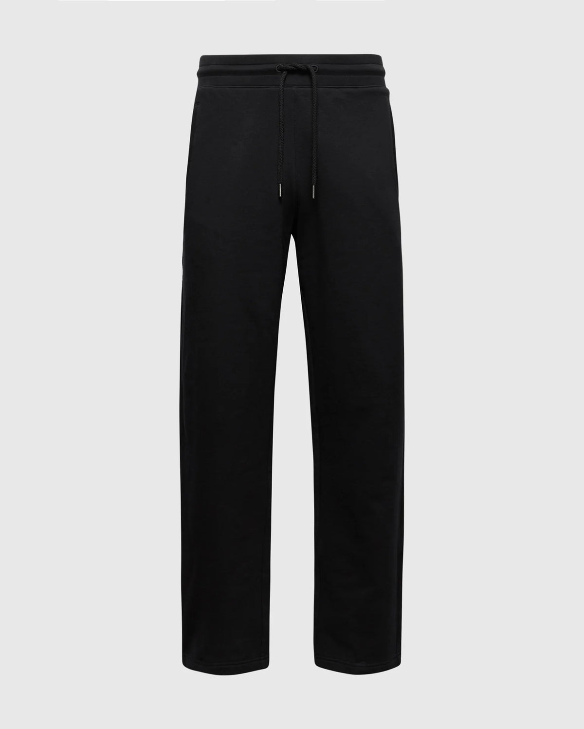 The MENS LYNX WIDE LEG CLASSIC FRENCH TERRY SWEATPANT by Psycho Bunny features black soft French terry fabric, an elastic waistband with drawstring, and a simple straight-leg style. Pictured against a light gray background, they are ideal for casual or athletic wear. SKU: B6P379E200.
