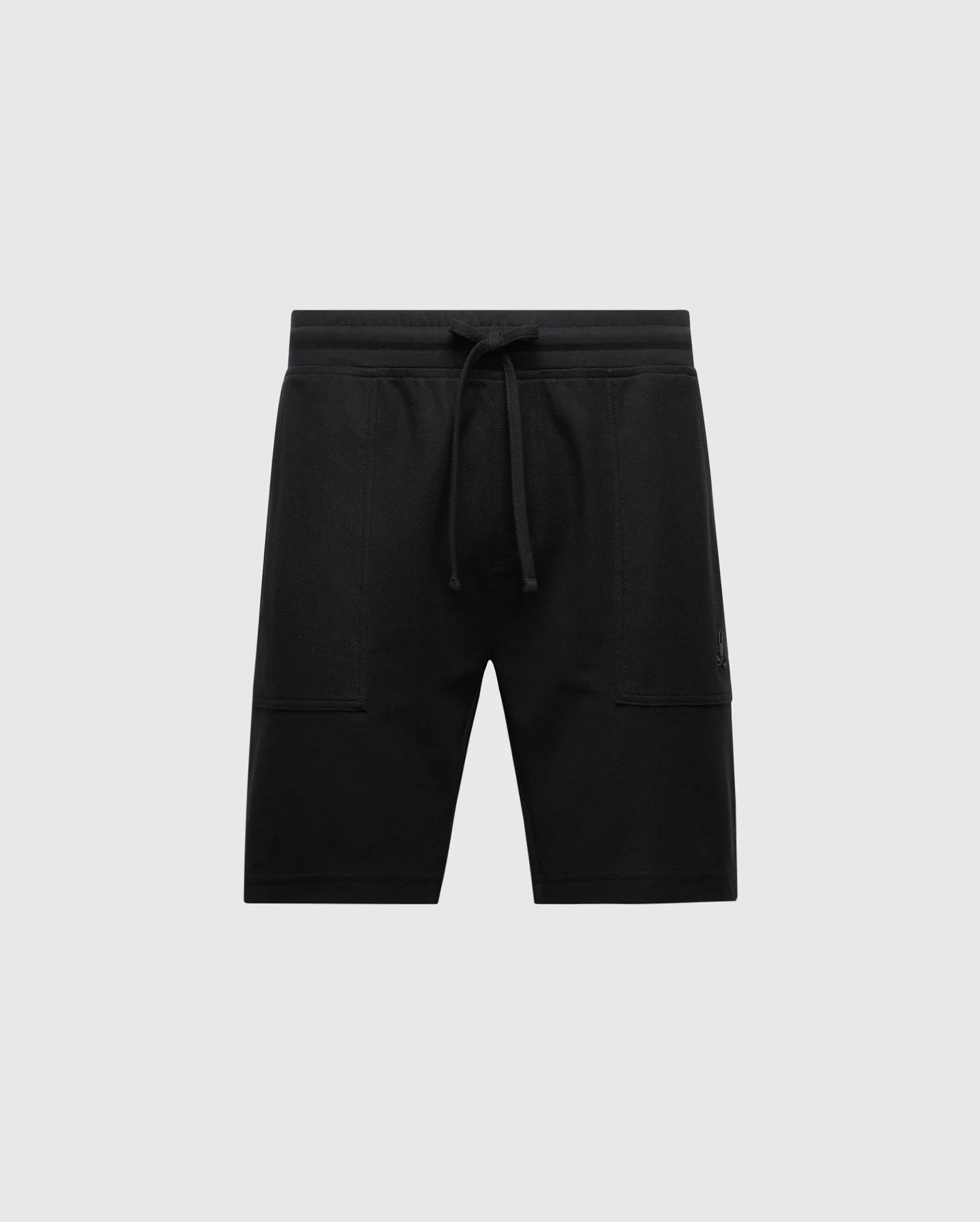 Introducing Psycho Bunny's MENS TAYLOR LIGHT PIQUE SWEATSHORT - B6R344F200, crafted from luxurious Pima cotton in black. These shorts feature a drawstring, two side pockets, and an embroidered Bunny logo on the left for casual-chic comfort against a plain light gray background.
