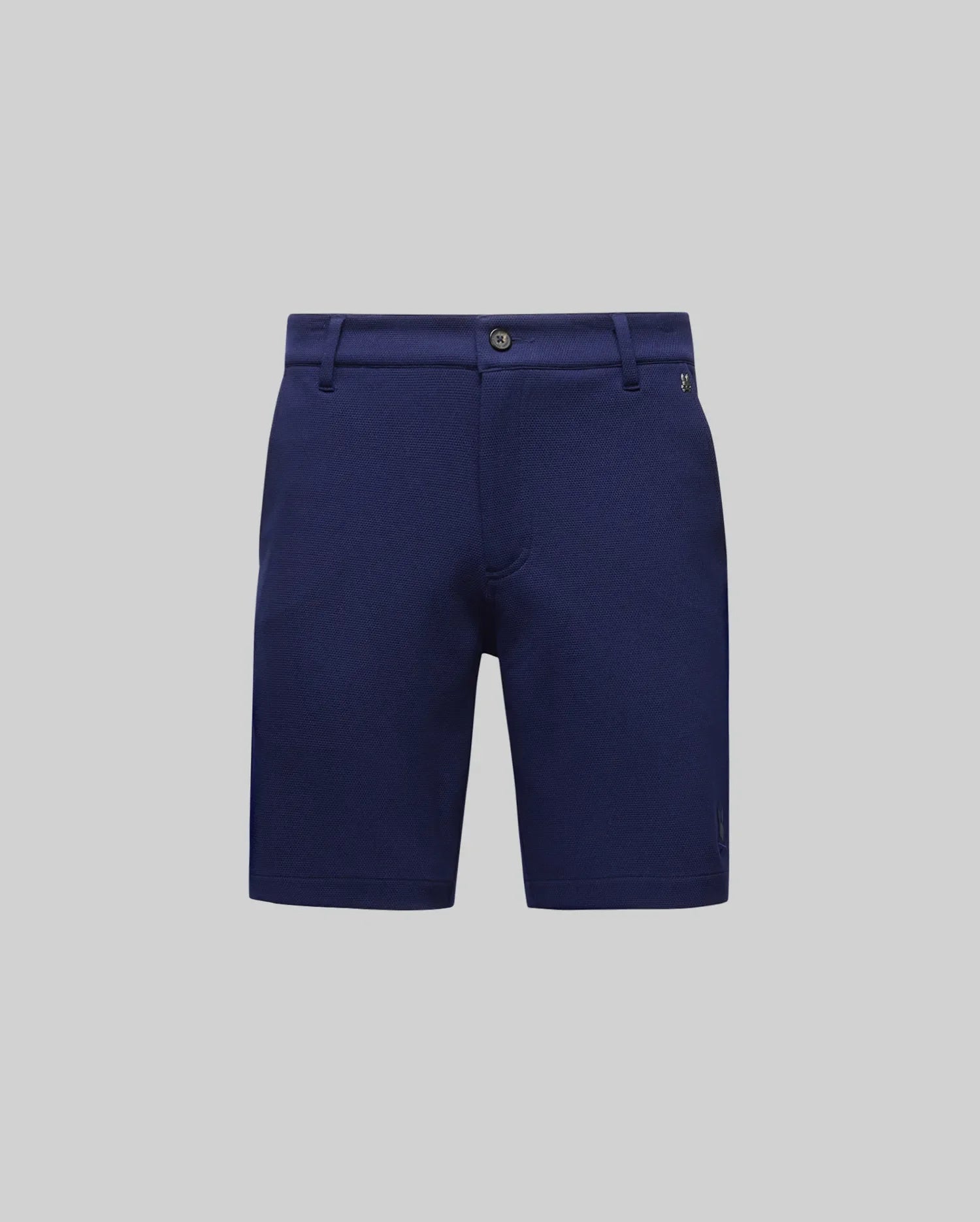 Psycho Bunny MENS SHIRO KNIT HONEYCOMB SHORT (B6R585F200) in navy blue, featuring belt loops, button closure, and side pockets in honeycomb-patterned piqué, shown against a plain light gray background.