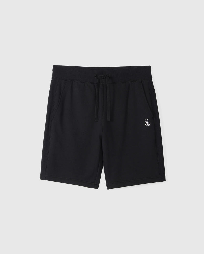 A pair of Psycho Bunny Mens Levy Fleece Sweatshorts (B6R862D200) in black cotton fleece, featuring an elastic waistband and a centered drawstring. These regular-fit shorts come with two side pockets and a small white skull and crossbones logo on the left thigh, displayed against a plain white background.