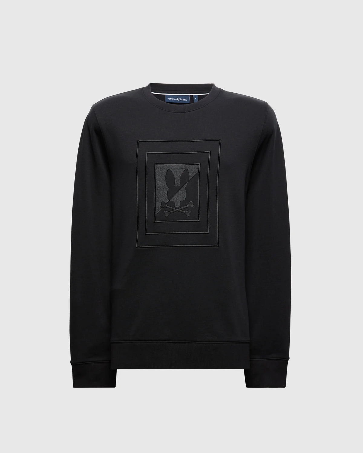 Check out the MENS OAK CITY CREW NECK - B6S274E200 by Psycho Bunny, a black men's sweater adorned with a subtle monochrome rabbit and crossbones design at the center. Crafted from premium quality materials, this stylish piece boasts raised embroidery for an extra touch of sophistication.