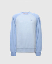 The MENS ARCHIE MELANGE COLOR BLOCK SWEATSHIRT - B6S630F200 by Psycho Bunny is showcased on a plain background. It features monochrome styling with raglan sleeves and an embroidered Bunny logo on the left chest.