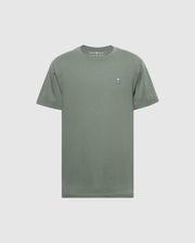 The Psycho Bunny Men's Classic Crew Neck Tee (B6U014B200) is a soft Pima cotton t-shirt in plain green, featuring a small embroidered bunny logo on the left chest. It's showcased against a light gray background, emphasizing its subtle charm.