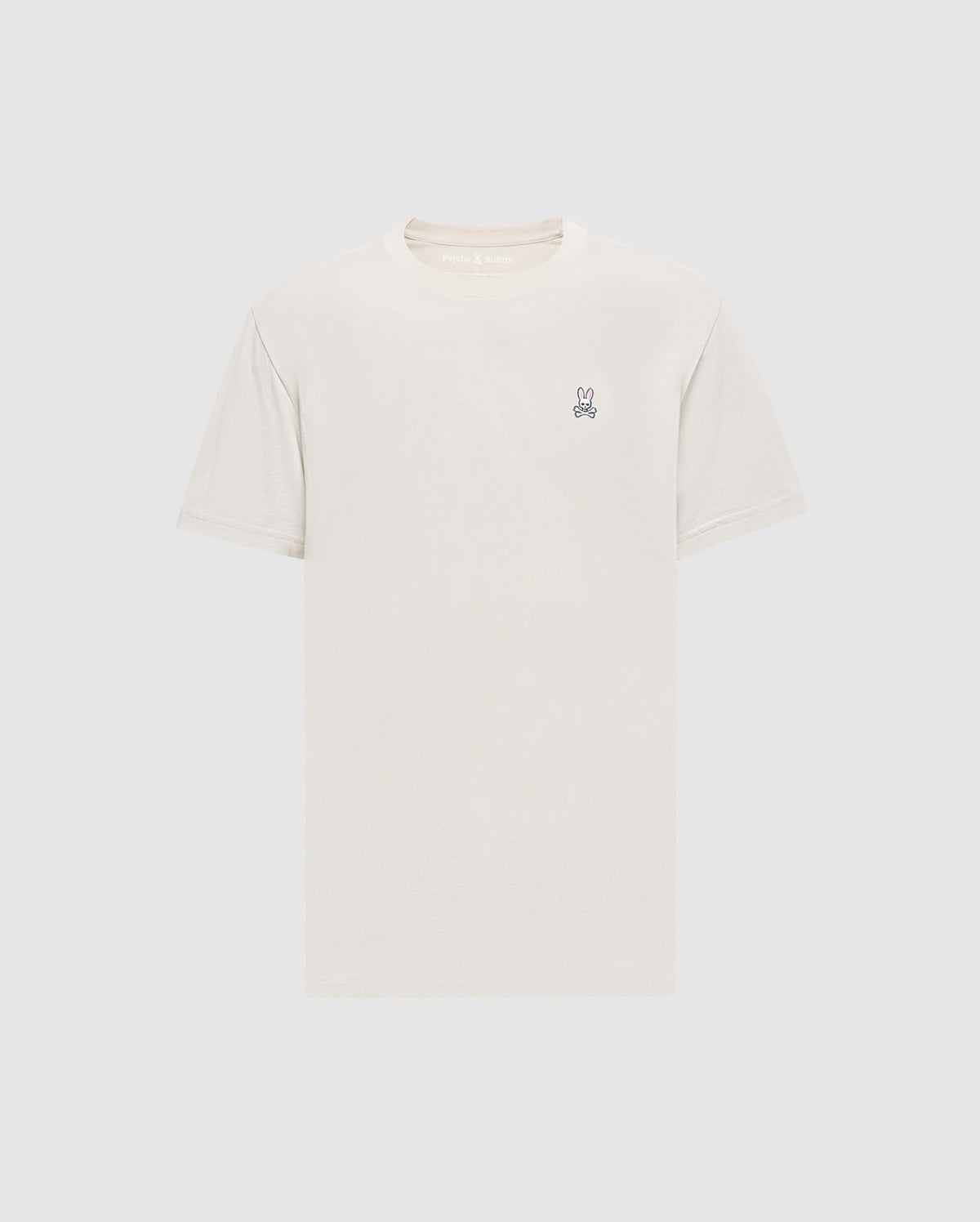 Psycho Bunny’s Men's Classic Crew Neck Tee (B6U014B200) in light beige has a small embroidered rabbit logo on the left chest. Made from premium Pima cotton jersey, it offers a simple, classic design with short sleeves.