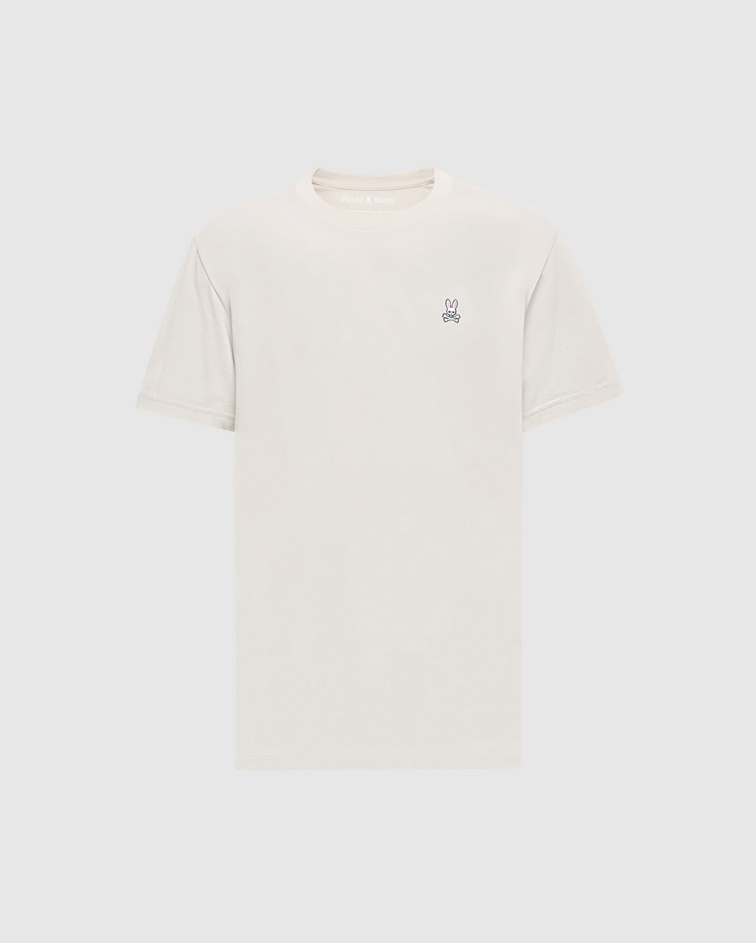 Psycho Bunny’s Men's Classic Crew Neck Tee (B6U014B200) in light beige has a small embroidered rabbit logo on the left chest. Made from premium Pima cotton jersey, it offers a simple, classic design with short sleeves.