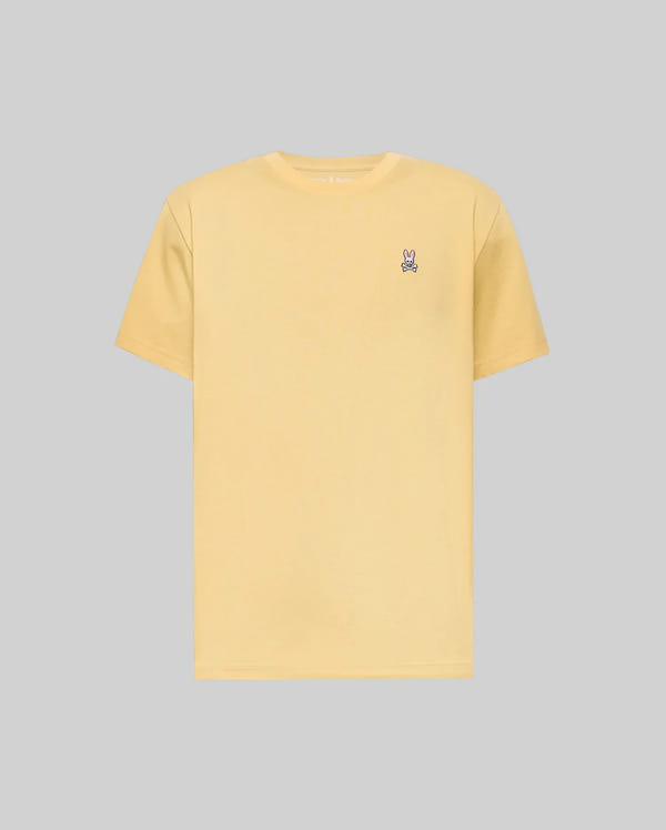 The Psycho Bunny MENS CLASSIC CREW NECK TEE - B6U014F200 is a plain light yellow premium jersey crewneck with a small embroidered bunny logo on the left chest, shown against a gray background.
