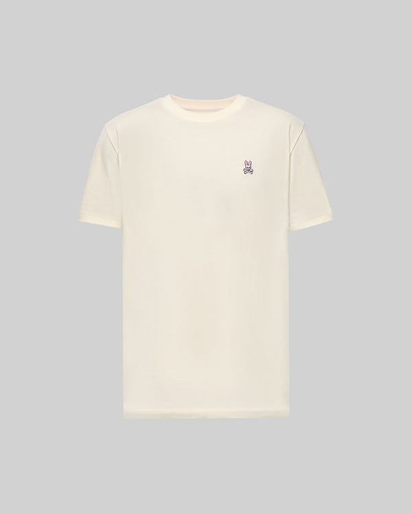 The Psycho Bunny MENS CLASSIC CREW NECK TEE (B6U014F200) is an off-white, regular fit crewneck featuring a small purple bunny graphic on the left chest, shown against a light gray background.
