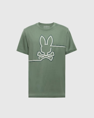 The Psycho Bunny MENS CHESTER GRAPHIC TEE (B6U022D200) is a green t-shirt crafted in Peru from premium Pima cotton. It features a playful white rabbit head and crossed bones design that stands out against its solid gray background.