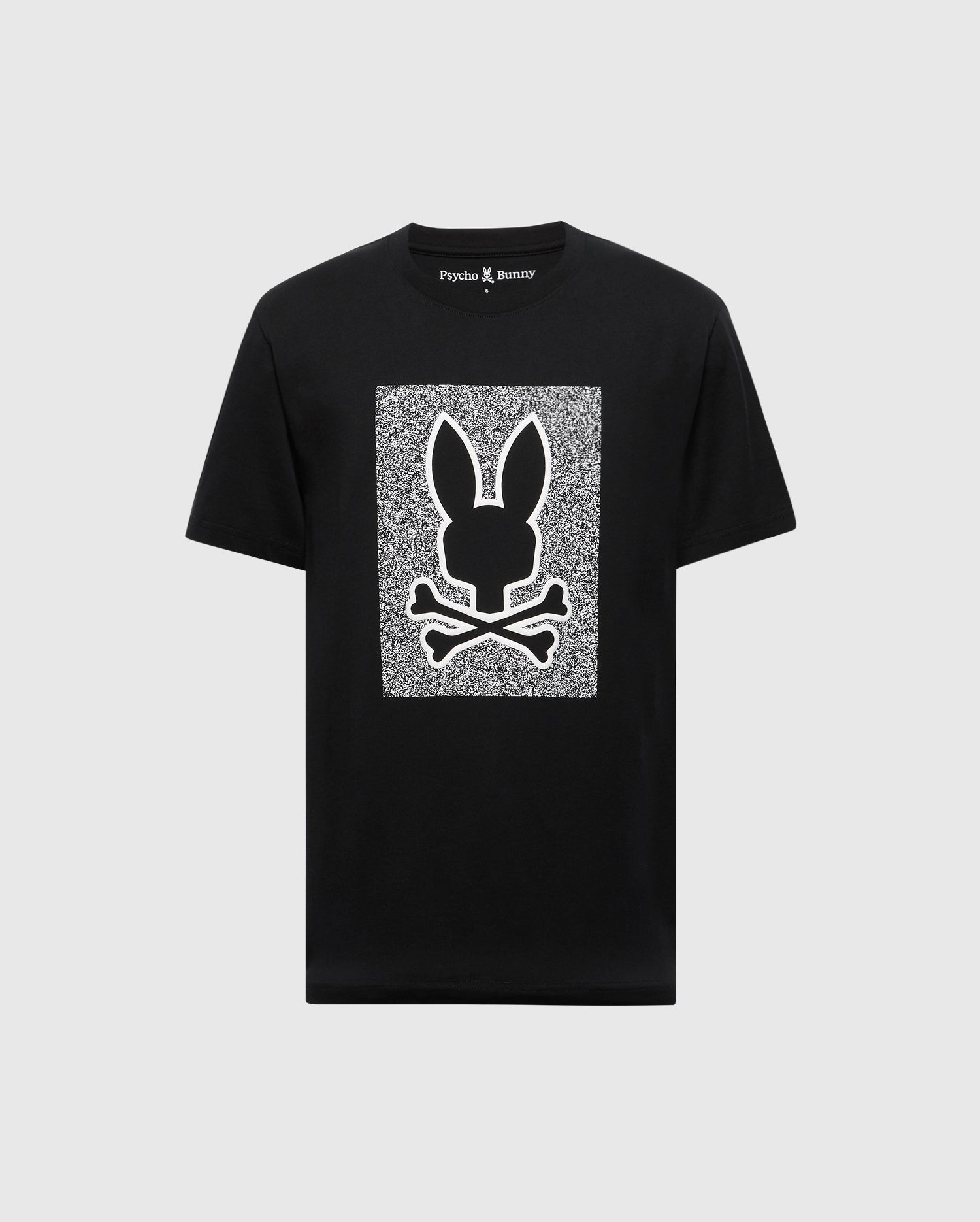The Mens Rockton Graphic Tee (B6U247C200) by Psycho Bunny is a black Pima Cotton T-shirt, showcasing a white rectangle with a bunny head and crossbones graphic. "Psycho Bunny" text adorns the top, crafted in Peru for premium comfort and style.
