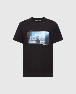 Introducing the Psycho Bunny MENS WARREN PHOTO REAL TEE - B6U388E200: a black Pima cotton tee featuring a stunning window cityscape with elegantly framed text around the skyline graphic.