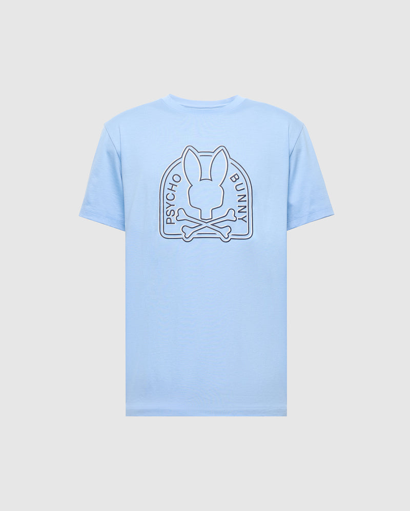 The light blue Psycho Bunny Men's Melbourne Graphic Tee (B6U410F200) presents a large back graphic of a stylized bunny head above crossbones with "Psycho Bunny" text. Made from eco-friendly Peruvian Pima cotton, it ensures comfort and sustainability.