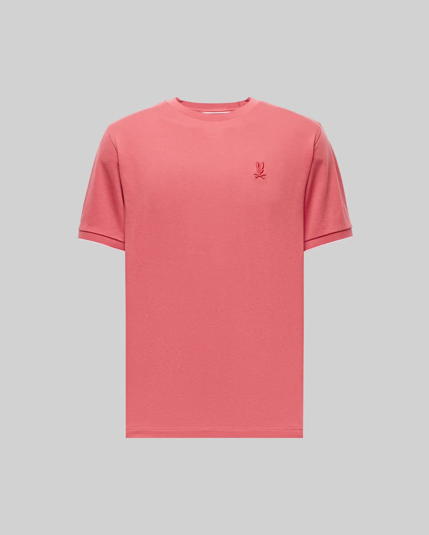The Psycho Bunny MENS BRYCE PERFORMANCE TEE (B6U490F200) is a plain pink short-sleeve Pima cotton tee with a small embroidered logo on the left chest, shown against a light gray background.