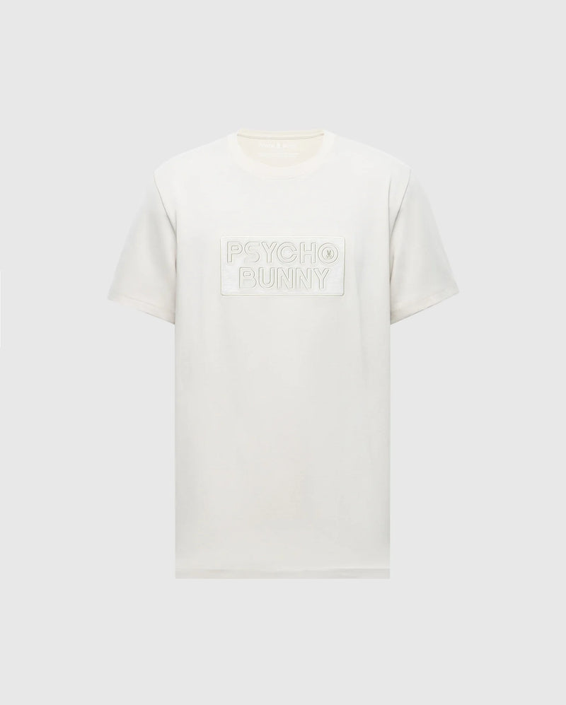 The Psycho Bunny MENS SYDNEY WORDMARK GRAPHIC TEE (B6U510F200) is a white short-sleeve Pima cotton shirt with a chest patch featuring the embossed Sydney Wordmark graphic on a light gray background.
