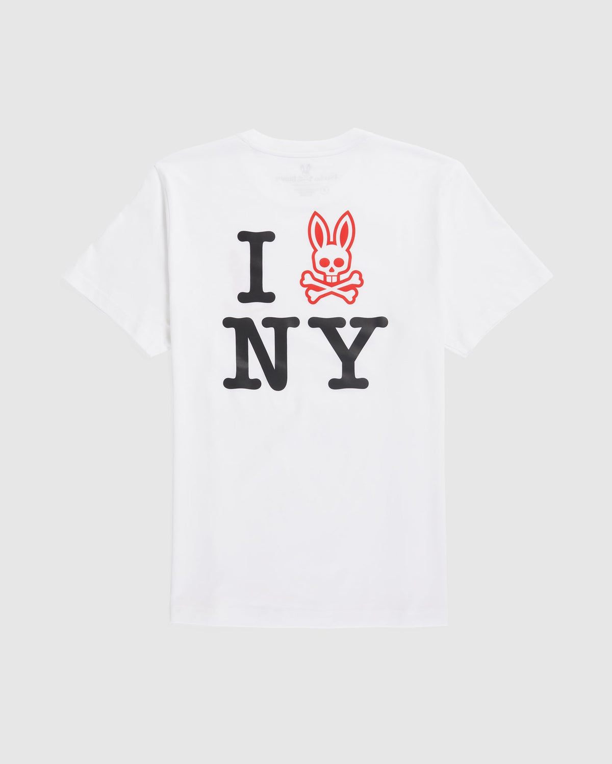 A white Pima cotton jersey T-shirt featuring the text "I [heart] NY" with a twist: instead of a heart, there’s a red cartoon rabbit with crossbones underneath it. The bold black letters and outlined red bunny logo stand out against the plain white background is the MENS NEW YORK TEE - B6U554W1PC from Psycho Bunny.