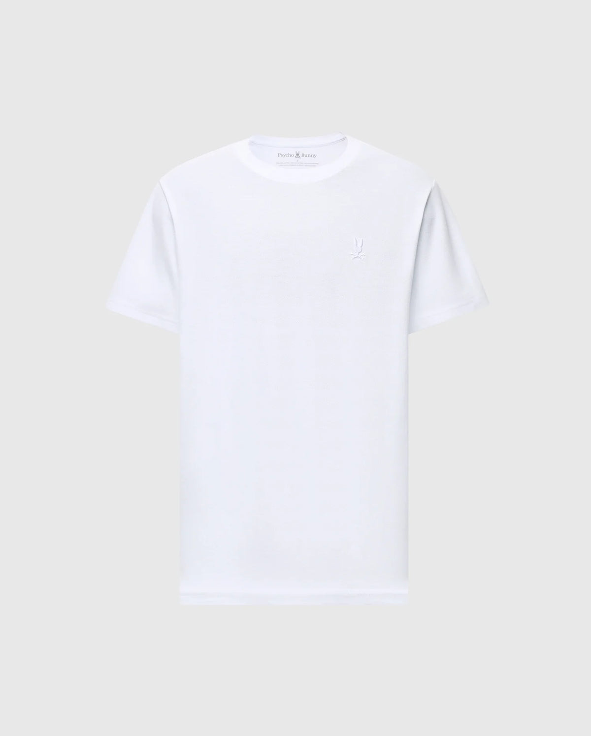 On a plain light gray background, the MENS TAYLOR PIQUE TEE by Psycho Bunny is a white short-sleeve crew neck t-shirt made from lightweight Pima cotton with a regular fit and features a subtle embroidered Bunny logo on the left chest.
