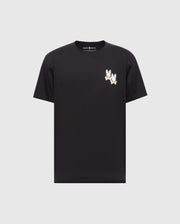 The Psycho Bunny MENS ELLIOT FRONT BACK GRAPHIC TEE - B6U605F200 is a black Pima cotton tee featuring a subtle gray background with a small white water-based print of a cartoon rabbit near the left shoulder.