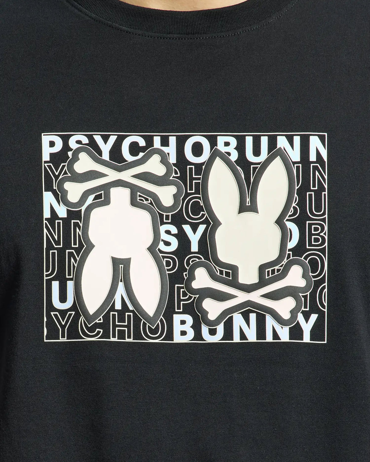The Psycho Bunny MENS GOLD COAST GRAPHIC TEE - B6U631F200 is a black, premium Pima cotton shirt featuring a graphic bunny silhouette with crossbones over "PSYCHO BUNNY" text, offering style and classic fit comfort.