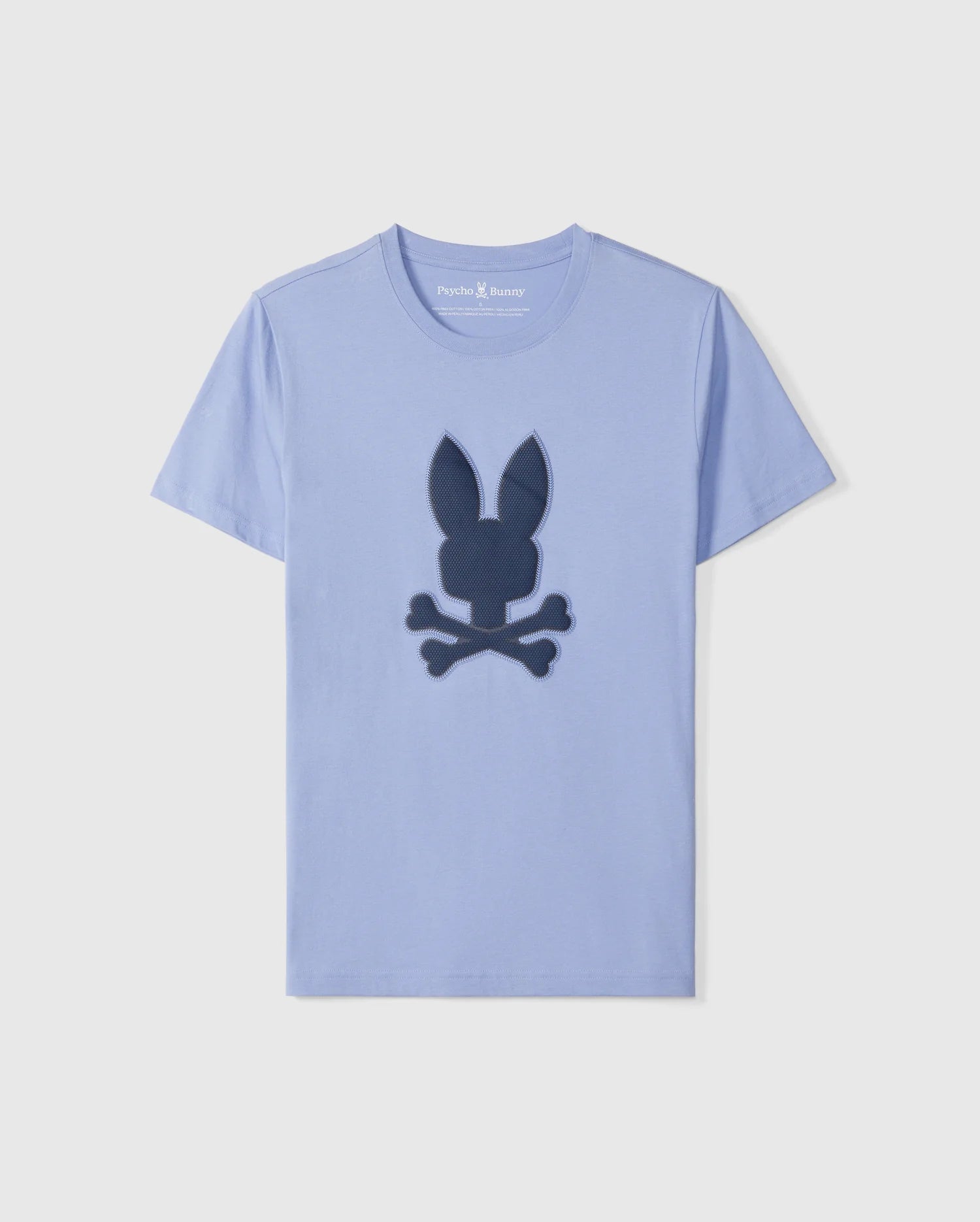 The Psycho Bunny Men's Riviera Graphic Tee - B6U639C200 features a large bunny with crossbones graphic on the chest, crafted from soft, durable Peruvian Pima cotton in blue for lasting comfort.