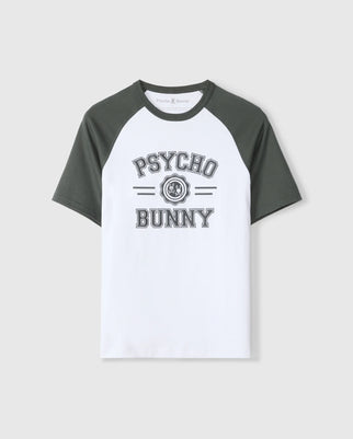 The MENS LONDON RAGLAN GRAPHIC TEE by Psycho Bunny (B6U896D200) is a white heavyweight jersey tee featuring dark green raglan sleeves. "Psycho Bunny" is prominently displayed in bold, black, varsity-style letters across the center, with the iconic bunny logo positioned between the words. Crafted from soft Pima cotton, this tee offers a relaxed fit for maximum comfort.