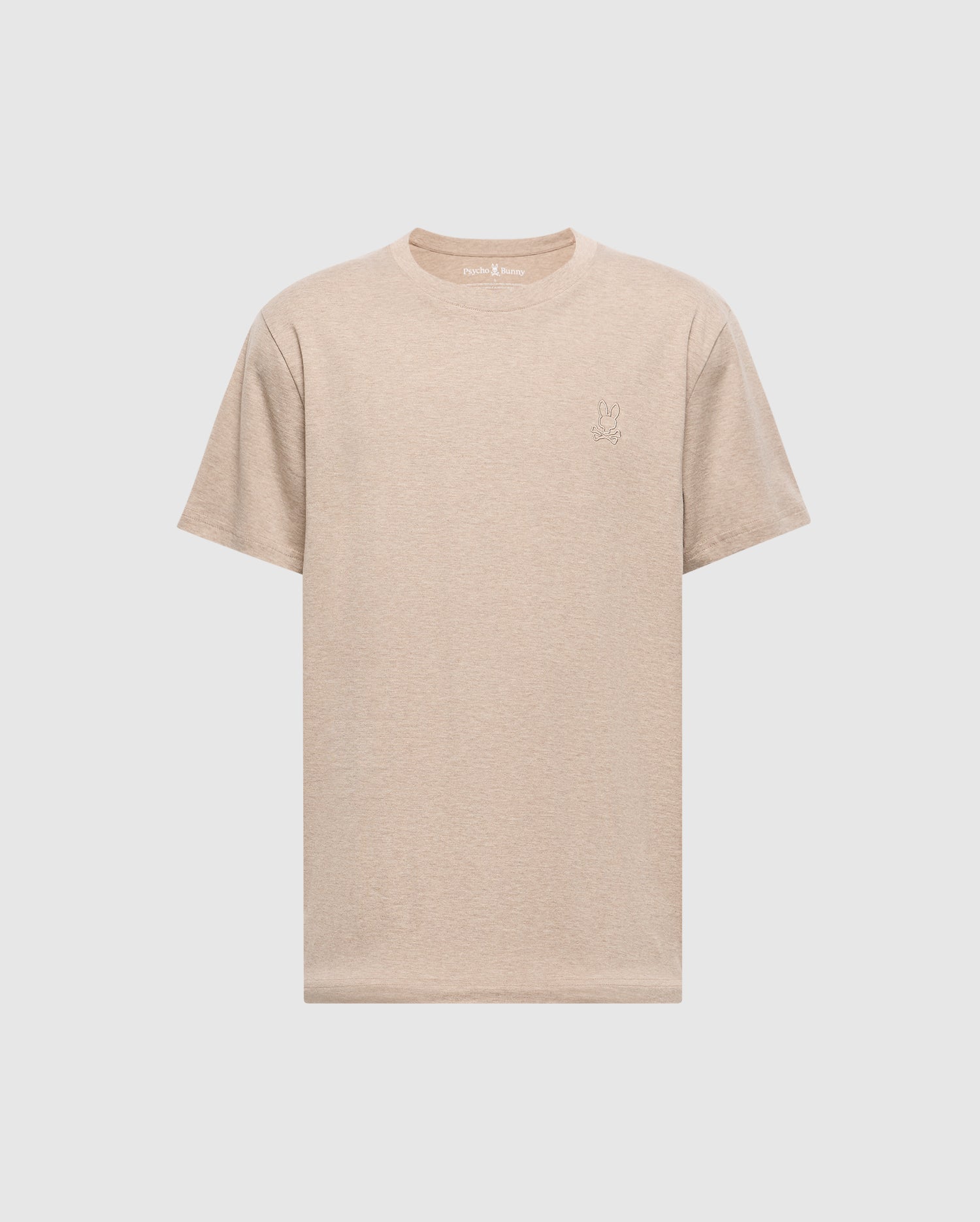 The Mens James Premium Crew Neck Tee by Psycho Bunny is a beige short-sleeve T-shirt made from quality Pima cotton, featuring a small embroidered rabbit outline on the left chest against a plain white background.