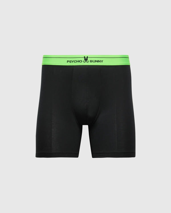 The MENS 3 PACK BOXER BRIEF - B6V347E200 by Psycho Bunny includes black boxer briefs made from premium Pima cotton. These briefs feature a vibrant green waistband with "Psycho Bunny" text and a black bunny logo. The sleek design is complemented by a plain gray background, ensuring both style and comfort.