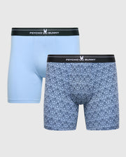 The Psycho Bunny Men's 2 Pack Boxer Briefs (B6V481F200) feature pairs in a soft Modal blend: one solid light blue and one with a playful bunny pattern, both with a black waistband displaying the brand name and iconic white bunny logo.