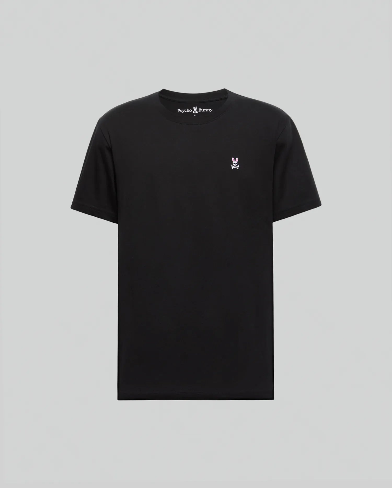 The Psycho Bunny MENS BIG AND TALL CLASSIC CREW NECK TEE (B9U014CRPC) is a black 100% Pima cotton tee featuring a small white and pink bunny logo on the left chest with "Psyny Bunny" text inside the collar, shown on a light gray background.