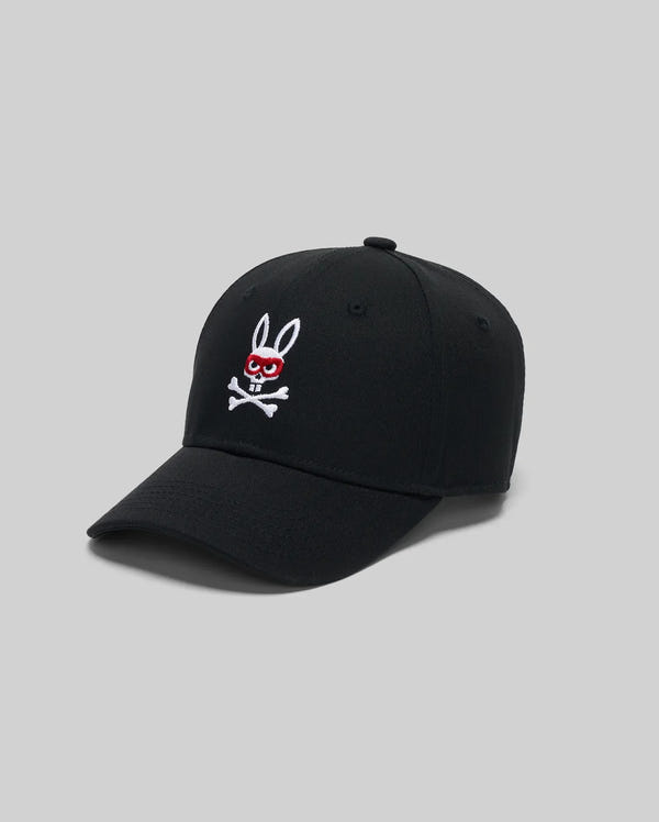 The Psycho Bunny KIDS MISCHIEF BASEBALL CAP (KO1500013) is crafted from 100% cotton and features an embroidered Mischief Bunny with red eyes and a red mask above white crossbones on a plain gray background.