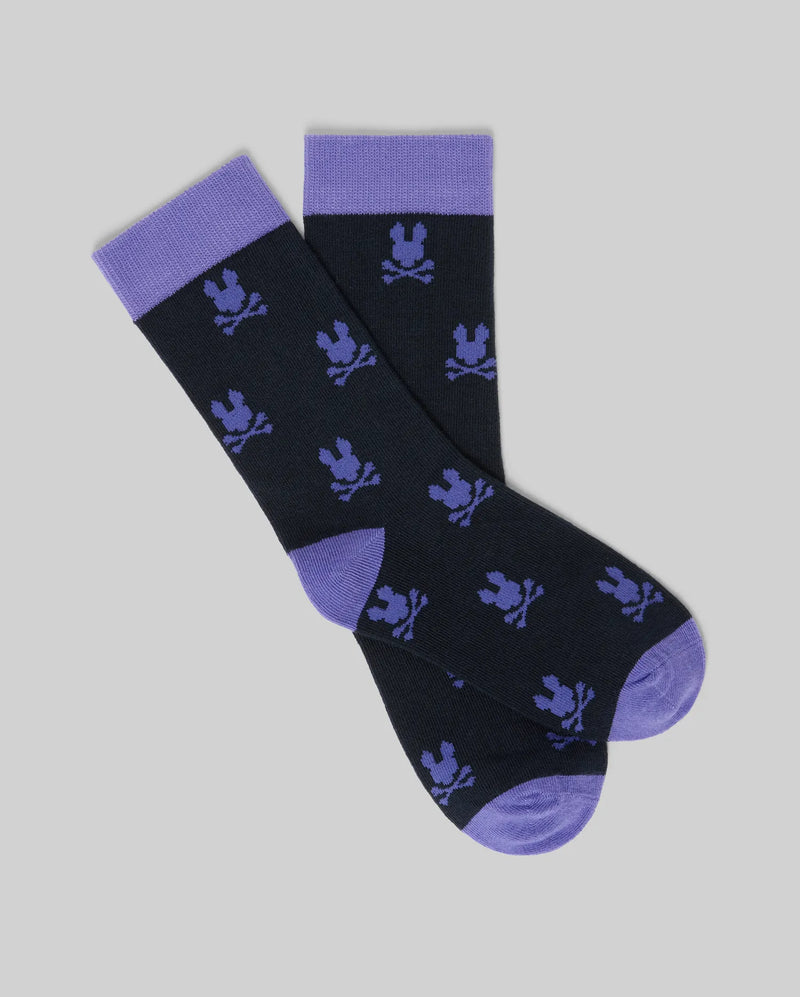 A 2-pack of kids' black crew dress socks by Psycho Bunny, featuring soft Pima cotton and an all-over purple bunny design—perfect for adding playful style to formalwear.