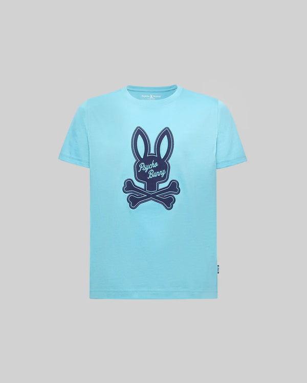The KIDS DEREK CENTER GRAPHIC TEE (KT0200006) by Psycho Bunny features a large navy bunny with crossed bones and "Psycho Bunny" text on soft Pima cotton in light blue, shown against a plain gray background.