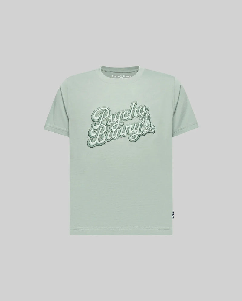 The KIDS ELIAS GRAPHIC TEE (KT0200013) by Psycho Bunny is a light green Pima cotton short-sleeve shirt with large retro "Psycho Bunny" script and a small bunny graphic on the chest, shown against a plain light background.