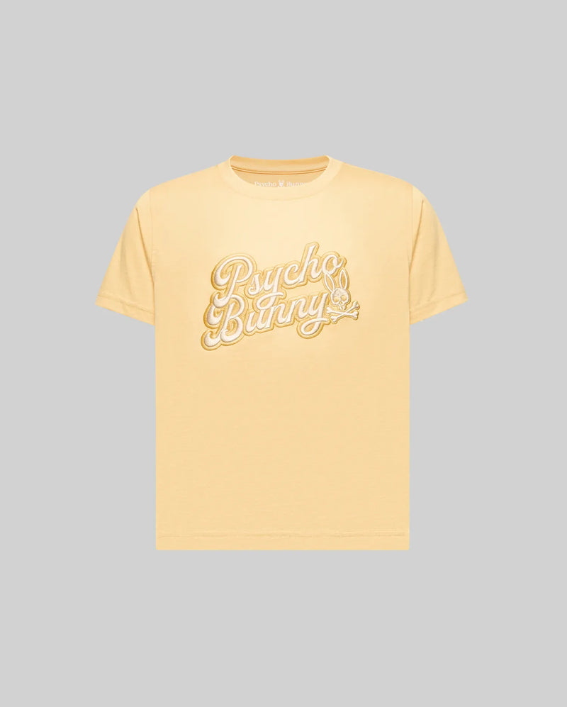 The KIDS ELIAS GRAPHIC TEE (KT0200013) by Psycho Bunny is a light yellow, retro-style short-sleeve Pima cotton t-shirt featuring "Psycho Bunny" in large white script and a bunny with a carrot, shown on a plain gray background.