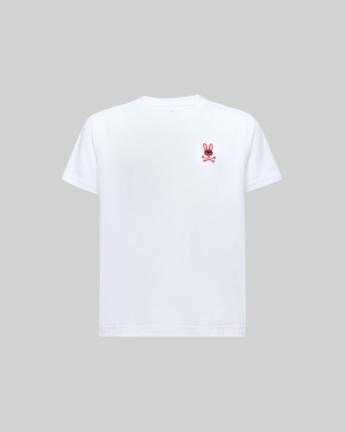 The Psycho Bunny KIDS MISCHIEF BUNNY TEE (KT0200023) is a plain white short-sleeve shirt featuring a small red and black cartoon bunny logo on the left chest, shown against a light gray background.