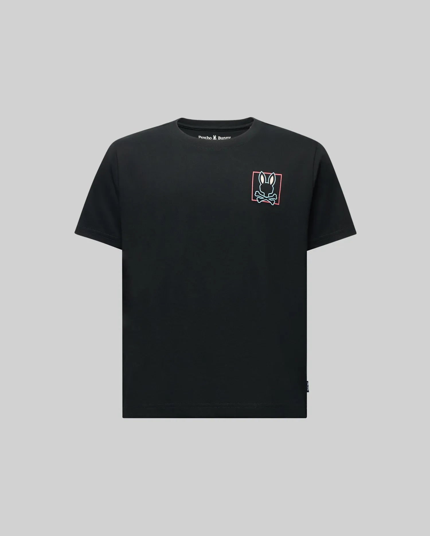 The Psycho Bunny KIDS JESSE GRAPHIC TEE (KT0200031) is a soft Pima cotton shirt in light gray, featuring a small white hand peace sign graphic outlined in red on the upper left chest with a water-based print.